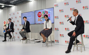 左から蟹江会長、春田氏、和田氏、山口事務局長。山口事務局長は、「一つの自治体ではできることに限界があるので、マルチステークホルダーの力を結集することが大切」と語った